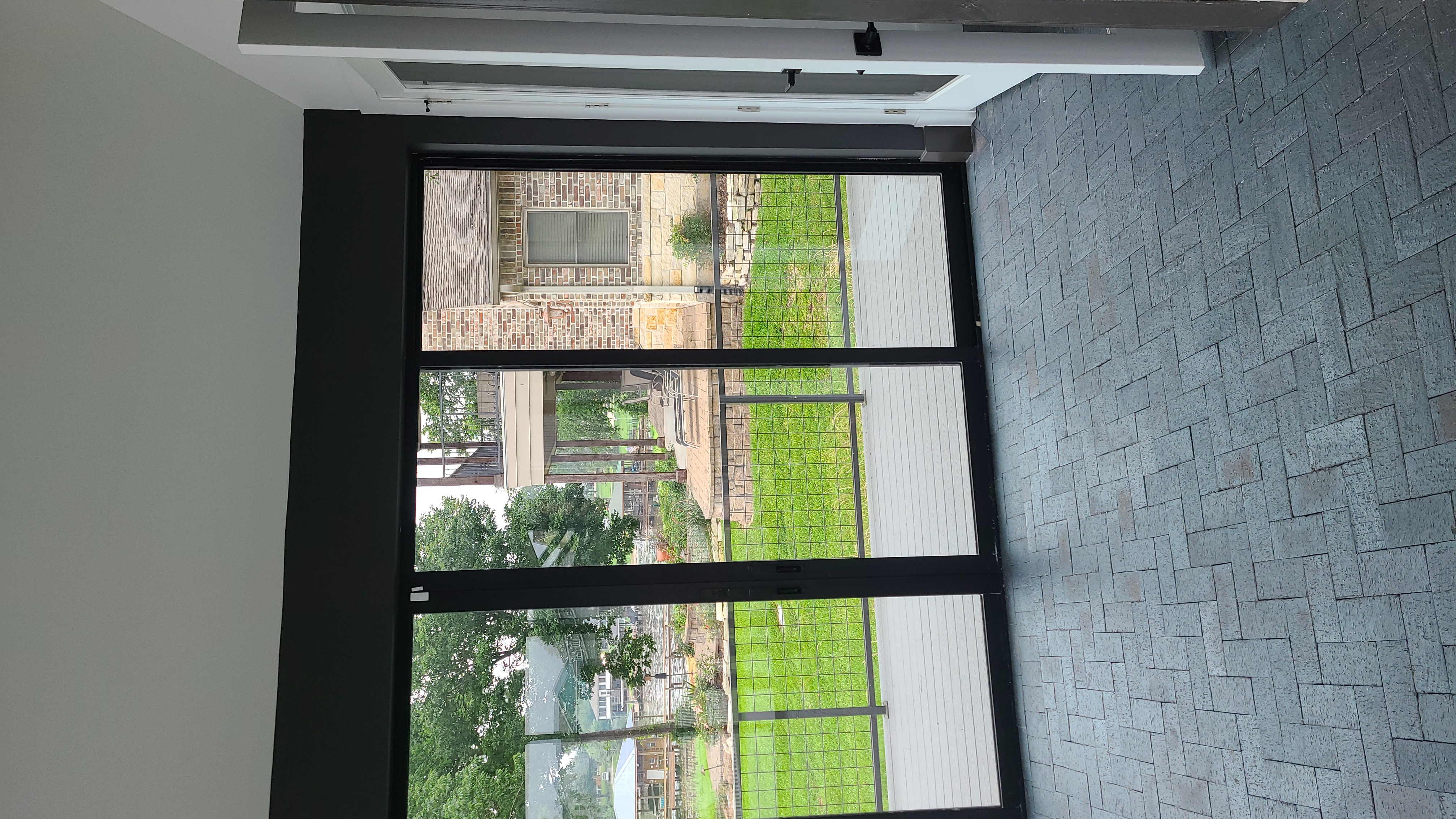 Interior glass doors and lake view